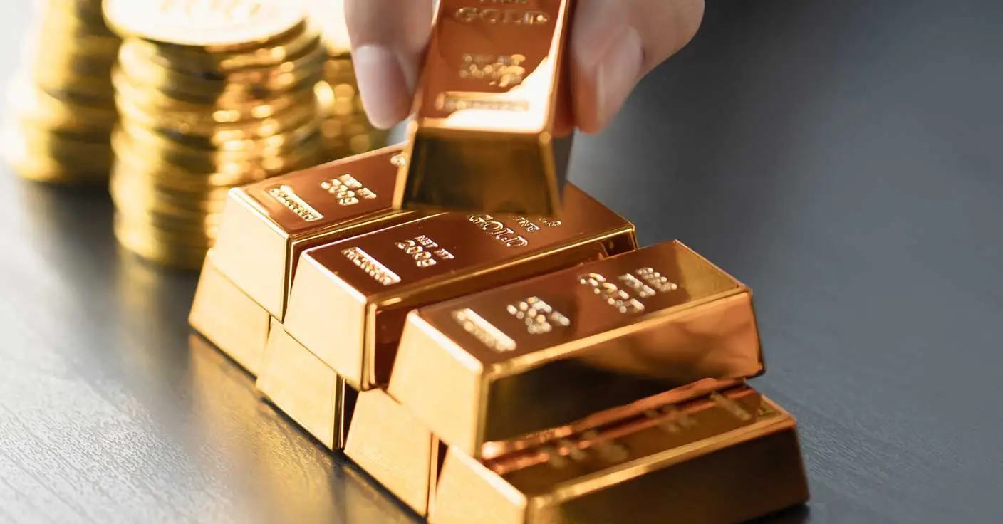 Goldbarren und Goldm&uuml;nzen